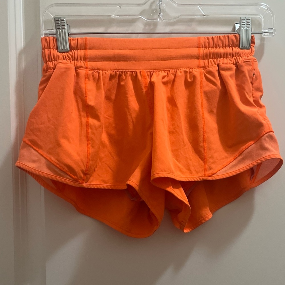 Lululemon Size 4 Reg Hotty Hot Low Rise LR Lined Short 4 inch Highlighter Orange